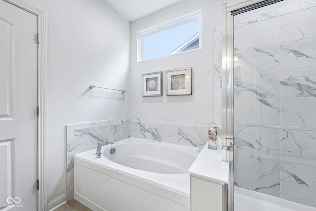 14458 Carlow Run, Carmel, IN 46074 - full bathroom featuring a bath and a marble finish shower
