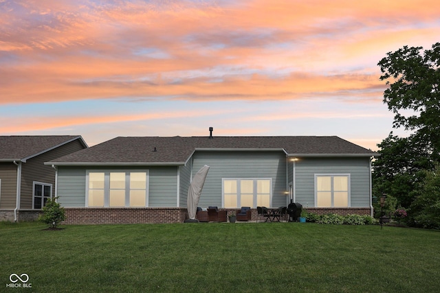 14458 Carlow Run, Carmel, IN 46074 - back of property with brick siding, a lawn, and a shingled roof