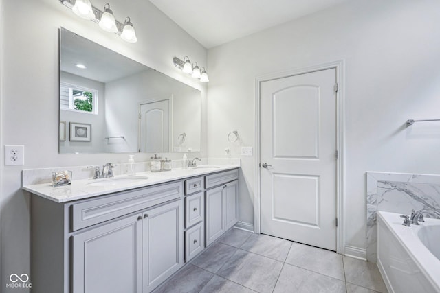 14458 Carlow Run, Carmel, IN 46074 - full bathroom featuring double vanity, a bath, tile patterned flooring, and baseboards