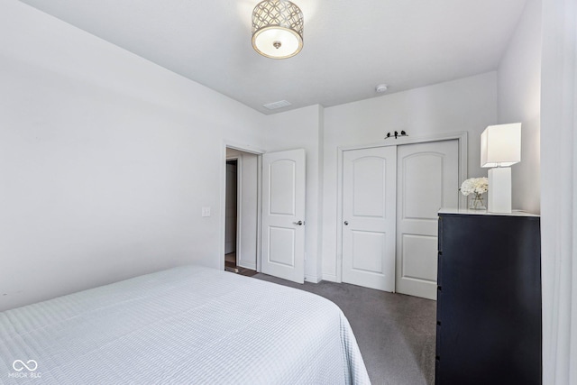 14458 Carlow Run, Carmel, IN 46074 - bedroom with a closet and dark carpet