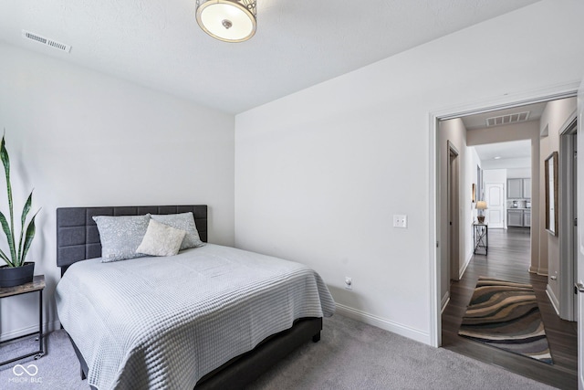 14458 Carlow Run, Carmel, IN 46074 - carpeted bedroom featuring baseboards