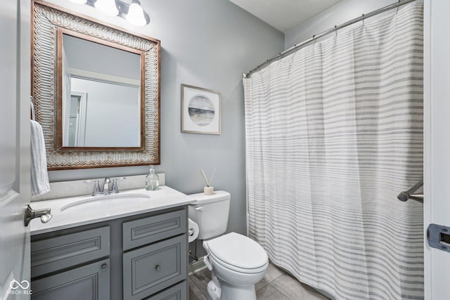 14458 Carlow Run, Carmel, IN 46074 - full bathroom with vanity, toilet, and tile patterned flooring