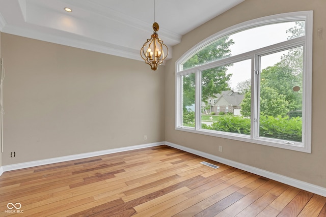 6610 Royal Oakland Dr, Indianapolis, IN 46236 - unfurnished room with light wood-style flooring, baseboards, a chandelier, recessed lighting, and crown molding
