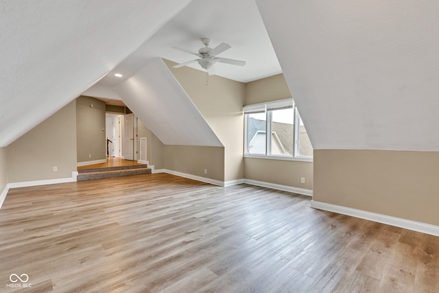6610 Royal Oakland Dr, Indianapolis, IN 46236 - bonus room with light wood-style floors, vaulted ceiling, baseboards, and a ceiling fan