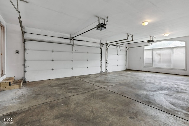 6610 Royal Oakland Dr, Indianapolis, IN 46236 - garage featuring a garage door opener