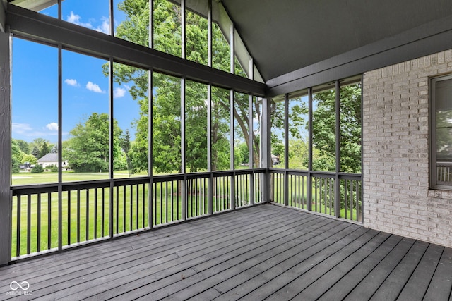 6610 Royal Oakland Dr, Indianapolis, IN 46236 - unfurnished sunroom with lofted ceiling and view of wooded area