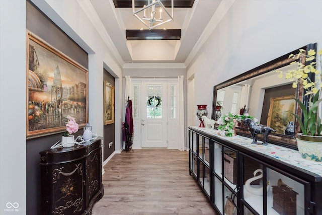 15593 Marsden Dr, Westfield, IN 46074 - entrance foyer featuring a chandelier, light wood-type flooring, and ornamental molding