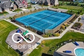 15593 Marsden Dr, Westfield, IN 46074 - aerial perspective of suburban area featuring a pool