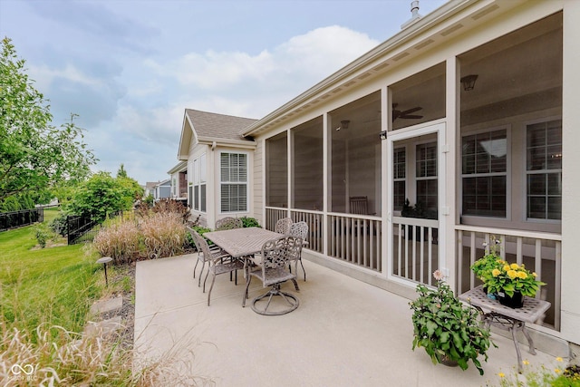 15593 Marsden Dr, Westfield, IN 46074 - view of patio with outdoor dining area and a sunroom