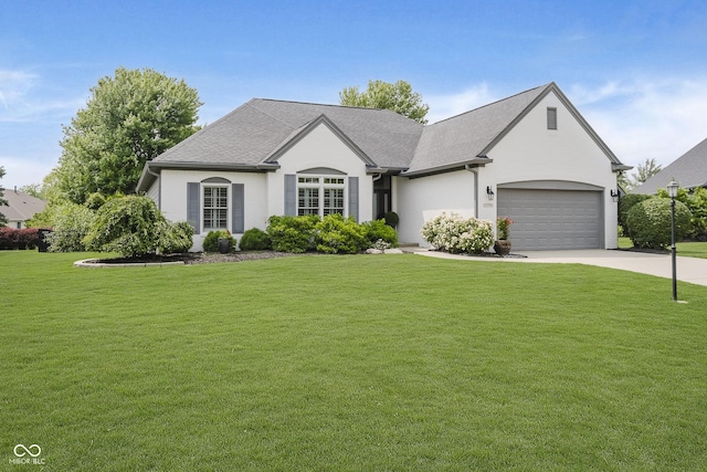 10510 Inverness Ct, Fishers, IN 46037 - view of front facade featuring a front lawn, driveway, an attached garage, and a shingled roof