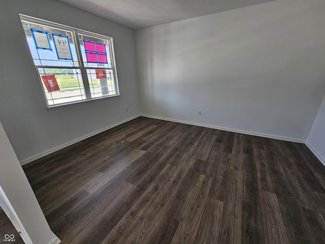 2271 Oakmont Dr, Plainfield, IN 46168 - empty room with dark wood finished floors and baseboards