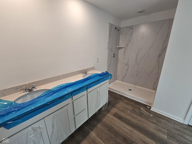 2271 Oakmont Dr, Plainfield, IN 46168 - full bathroom with a marble finish shower, wood finished floors, and double vanity