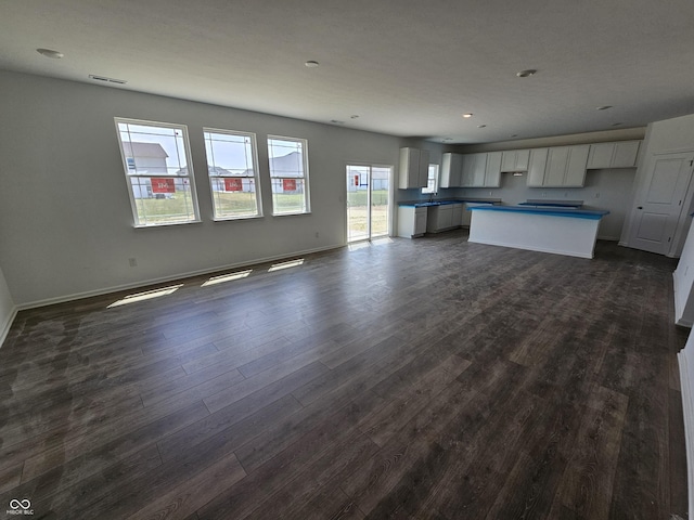 2271 Oakmont Dr, Plainfield, IN 46168 - unfurnished living room featuring dark wood finished floors and recessed lighting
