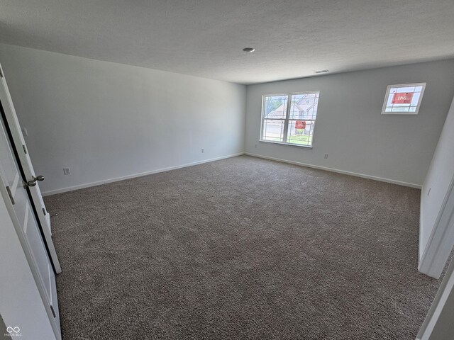 2271 Oakmont Dr, Plainfield, IN 46168 - spare room with carpet floors and a textured ceiling