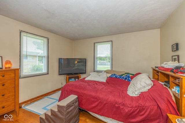 2445 S Bolton Ave, Indianapolis, IN 46203 - bedroom with wood finished floors and baseboards
