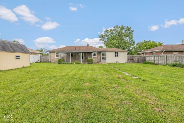 2445 S Bolton Ave, Indianapolis, IN 46203 - rear view of property featuring an outdoor structure