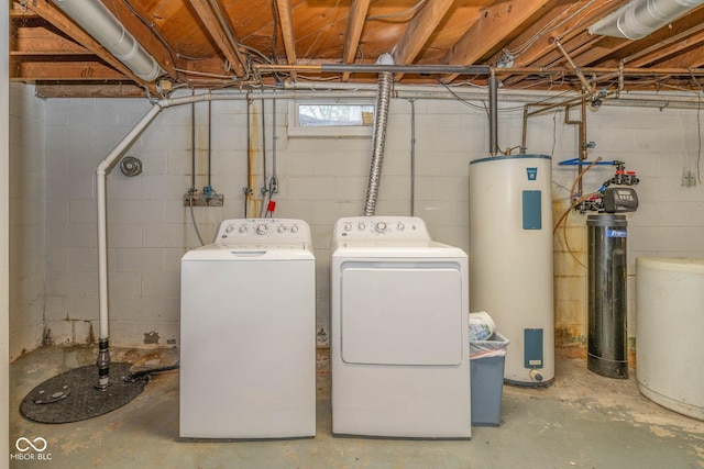 2445 S Bolton Ave, Indianapolis, IN 46203 - laundry area featuring water heater and washer and dryer