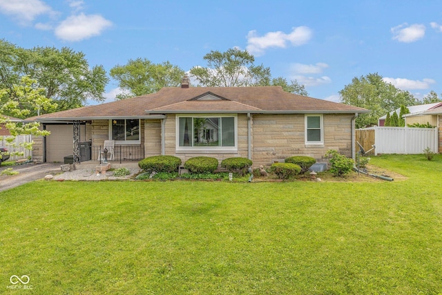 2445 S Bolton Ave, Indianapolis, IN 46203 - ranch-style home with stone siding, a garage, a chimney, asphalt driveway, and roof with shingles
