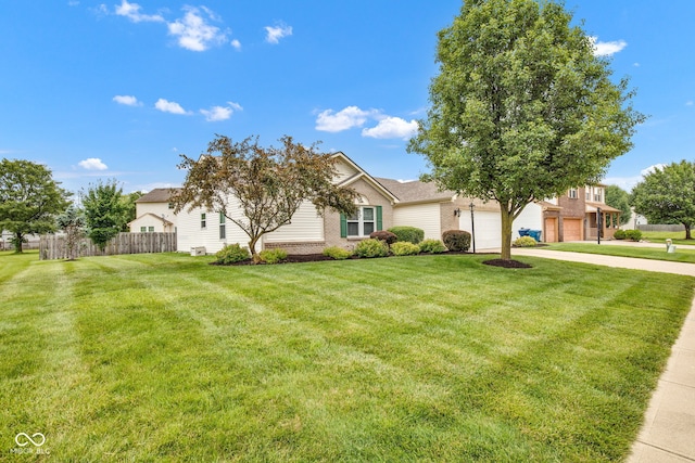 2163 Bradford Trace Blvd, Indianapolis, IN 46229 - view of property hidden behind natural elements with concrete driveway, a garage, and brick siding