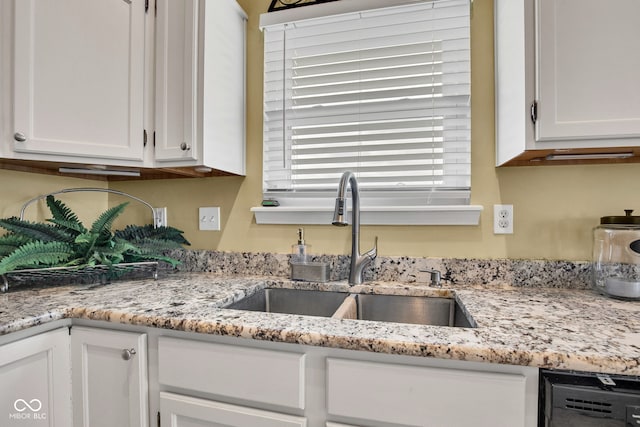 2163 Bradford Trace Blvd, Indianapolis, IN 46229 - kitchen with white cabinets, light stone countertops, and dishwasher