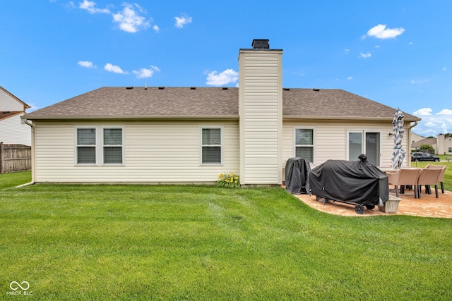 2163 Bradford Trace Blvd, Indianapolis, IN 46229 - rear view of property with a chimney, a patio, and roof with shingles
