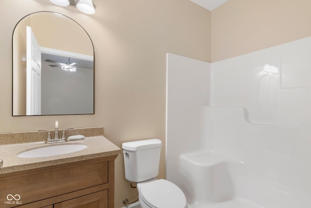 232 E Main St, Austin, IN 47102 - full bathroom featuring toilet, vanity, a shower, and a ceiling fan
