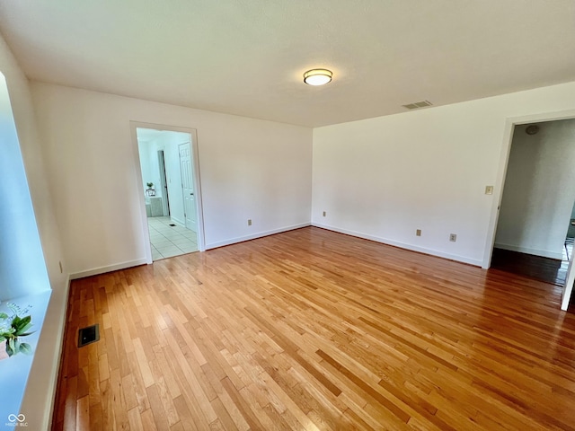67 Bittersweet Ct, Seymour, IN 47274 - unfurnished room with light wood finished floors and baseboards