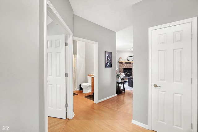 7312 Drum Castle Ct, Indianapolis, IN 46259 - corridor with light wood-style floors and baseboards