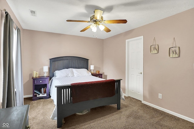 7312 Drum Castle Ct, Indianapolis, IN 46259 - carpeted bedroom with baseboards and a ceiling fan