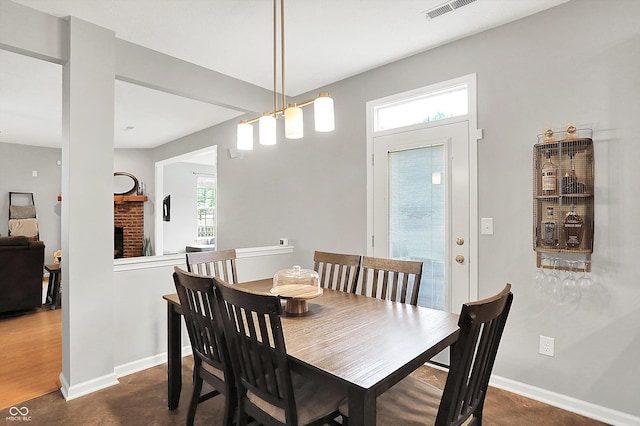 7312 Drum Castle Ct, Indianapolis, IN 46259 - dining space with baseboards and a fireplace