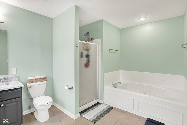 7312 Drum Castle Ct, Indianapolis, IN 46259 - bathroom with vanity, a garden tub, a stall shower, tile patterned flooring, and toilet