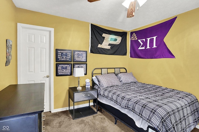 7312 Drum Castle Ct, Indianapolis, IN 46259 - bedroom with carpet flooring, baseboards, and a ceiling fan