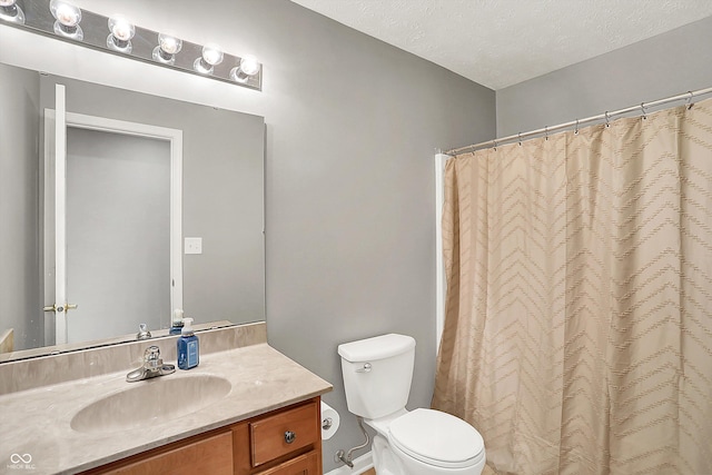 7312 Drum Castle Ct, Indianapolis, IN 46259 - bathroom with toilet, vanity, and curtained shower