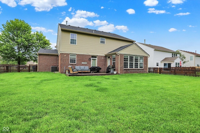 7312 Drum Castle Ct, Indianapolis, IN 46259 - rear view of property with an outdoor hangout area, central AC unit, and brick siding