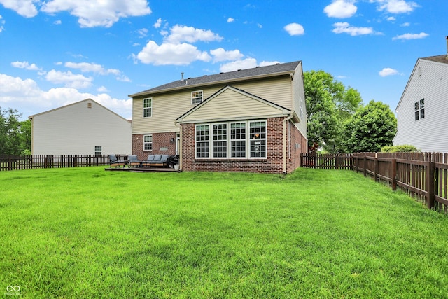 7312 Drum Castle Ct, Indianapolis, IN 46259 - rear view of property featuring brick siding and outdoor lounge area