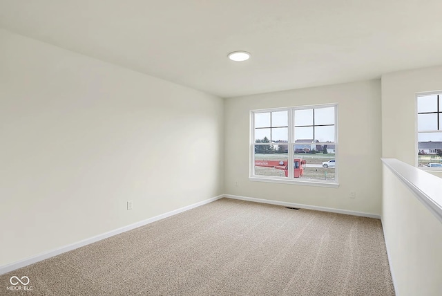 3927 Wren Dr, Brownsburg, IN 46112 - spare room with light colored carpet and baseboards