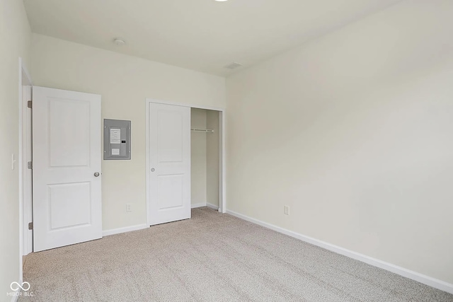 3927 Wren Dr, Brownsburg, IN 46112 - unfurnished bedroom featuring electric panel, carpet floors, baseboards, and a closet