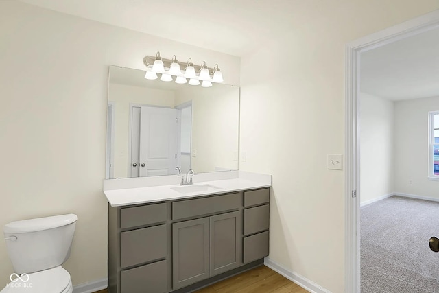 3927 Wren Dr, Brownsburg, IN 46112 - bathroom with vanity, toilet, and baseboards