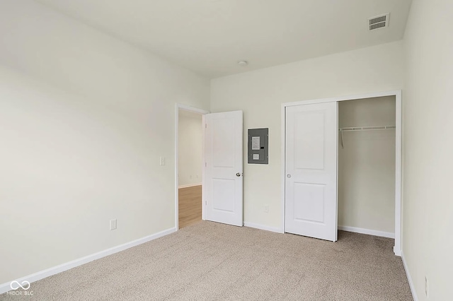 3927 Wren Dr, Brownsburg, IN 46112 - unfurnished bedroom with electric panel, carpet, baseboards, and a closet