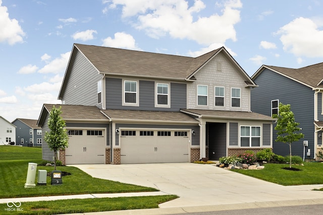 11588 Brooks Farm Blvd, Noblesville, IN 46060 - craftsman house with brick siding, concrete driveway, a front yard, and a garage
