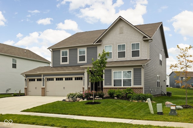 11588 Brooks Farm Blvd, Noblesville, IN 46060 - craftsman house with brick siding, concrete driveway, a front lawn, and a garage