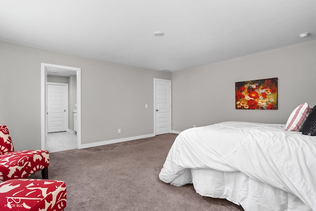 11588 Brooks Farm Blvd, Noblesville, IN 46060 - carpeted bedroom with baseboards and ensuite bath