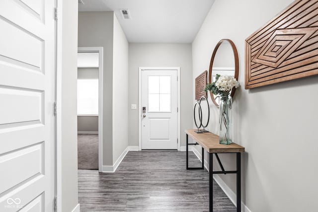 11588 Brooks Farm Blvd, Noblesville, IN 46060 - doorway with baseboards and dark wood finished floors