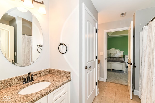 13909 Waterway Blvd, Fishers, IN 46040 - full bathroom featuring vanity, ensuite bathroom, baseboards, and tile patterned floors