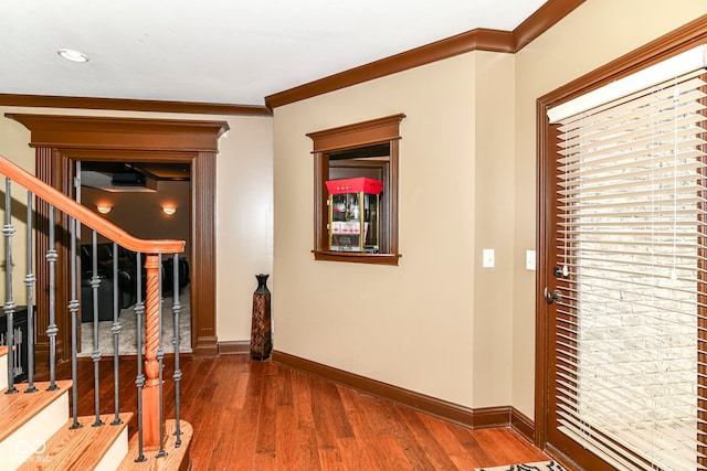 13909 Waterway Blvd, Fishers, IN 46040 - entrance foyer with stairway, baseboards, wood finished floors, and ornamental molding