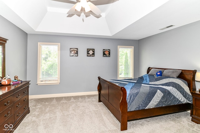 13909 Waterway Blvd, Fishers, IN 46040 - carpeted bedroom with a raised ceiling, multiple windows, baseboards, and a ceiling fan