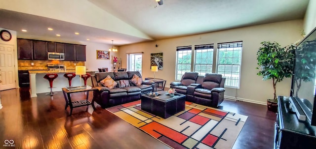 6110 Pelican Ln, Columbus, IN 47201 - living room with lofted ceiling, recessed lighting, dark wood-type flooring, and baseboards