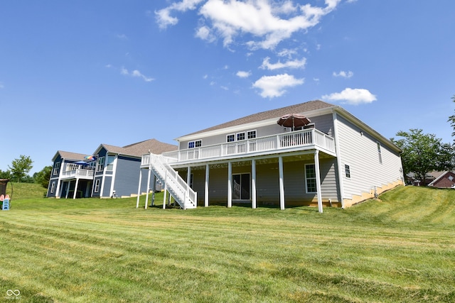 6110 Pelican Ln, Columbus, IN 47201 - rear view of property featuring a deck, a lawn, and stairway