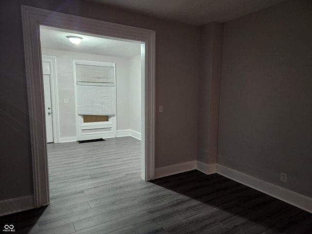 323-325 N Gladstone Ave, Indianapolis, IN 46201 - hall featuring dark wood finished floors and baseboards