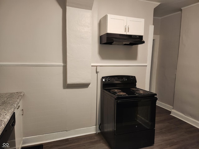 323-325 N Gladstone Ave, Indianapolis, IN 46201 - kitchen with black / electric stove, under cabinet range hood, dark wood finished floors, white cabinets, and light stone countertops